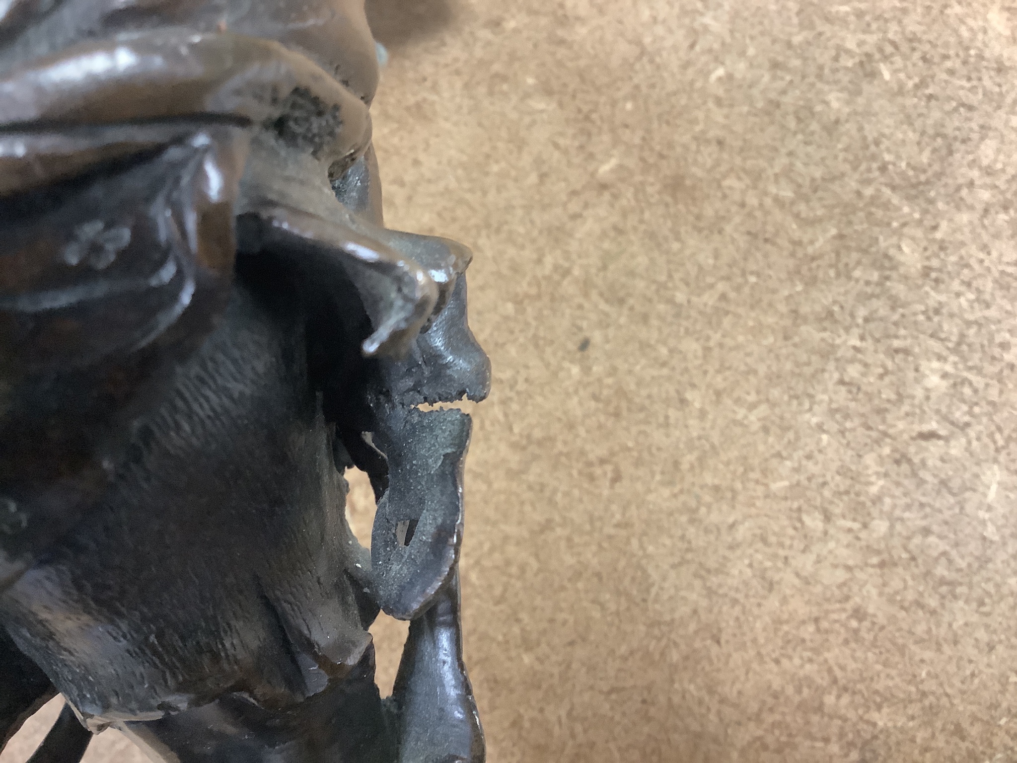 A Meiji period Japanese bronze figural censer, study of a demon, 31cm